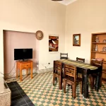 Morgan Suite interior featuring restored architectural integrity and wood finishes