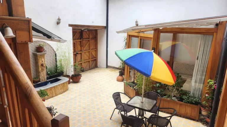 Detailed view of the furnished outdoor courtyard at Casa Tierra