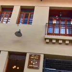 Restored historic facade of Casa Tierra in Cuenca Ecuador