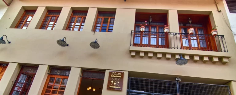 Restored historic facade of Casa Tierra in Cuenca Ecuador