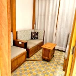 El Invernadero fixed-roof glass solarium and enclosed courtyard lounge