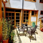 Restored historic courtyard and conservatory at Casa Tierra Cuenca