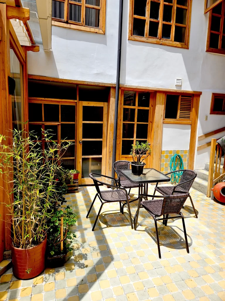 Restored historic courtyard and conservatory at Casa Tierra Cuenca